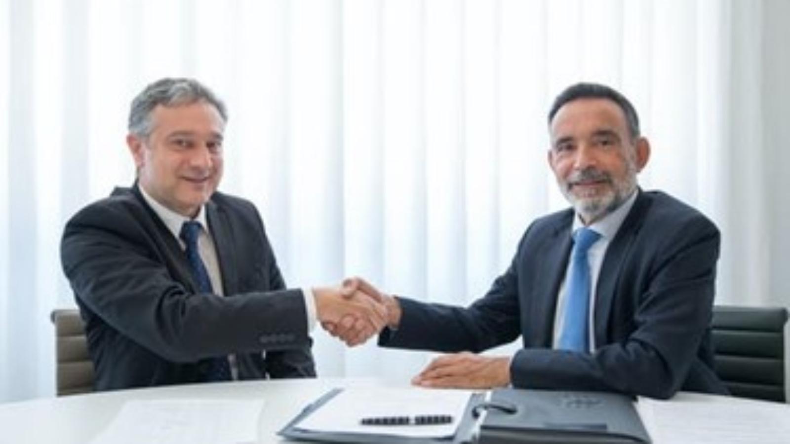 An immigration lawyer helping a man with documentation